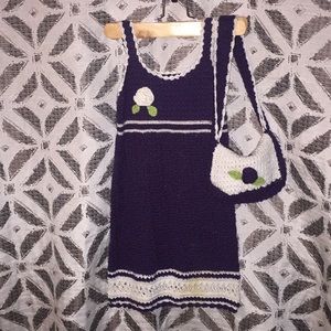 Navy and white knitted dress with matching purse